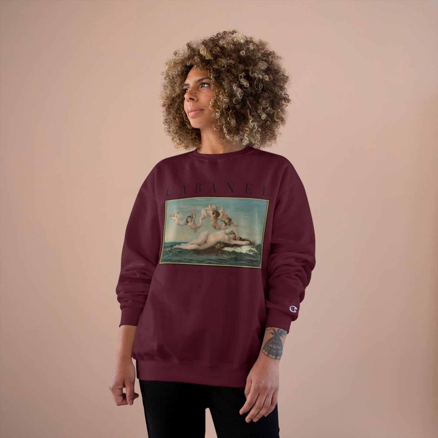 woman wearing cabanel wearable art sweatshirt in the color maroon