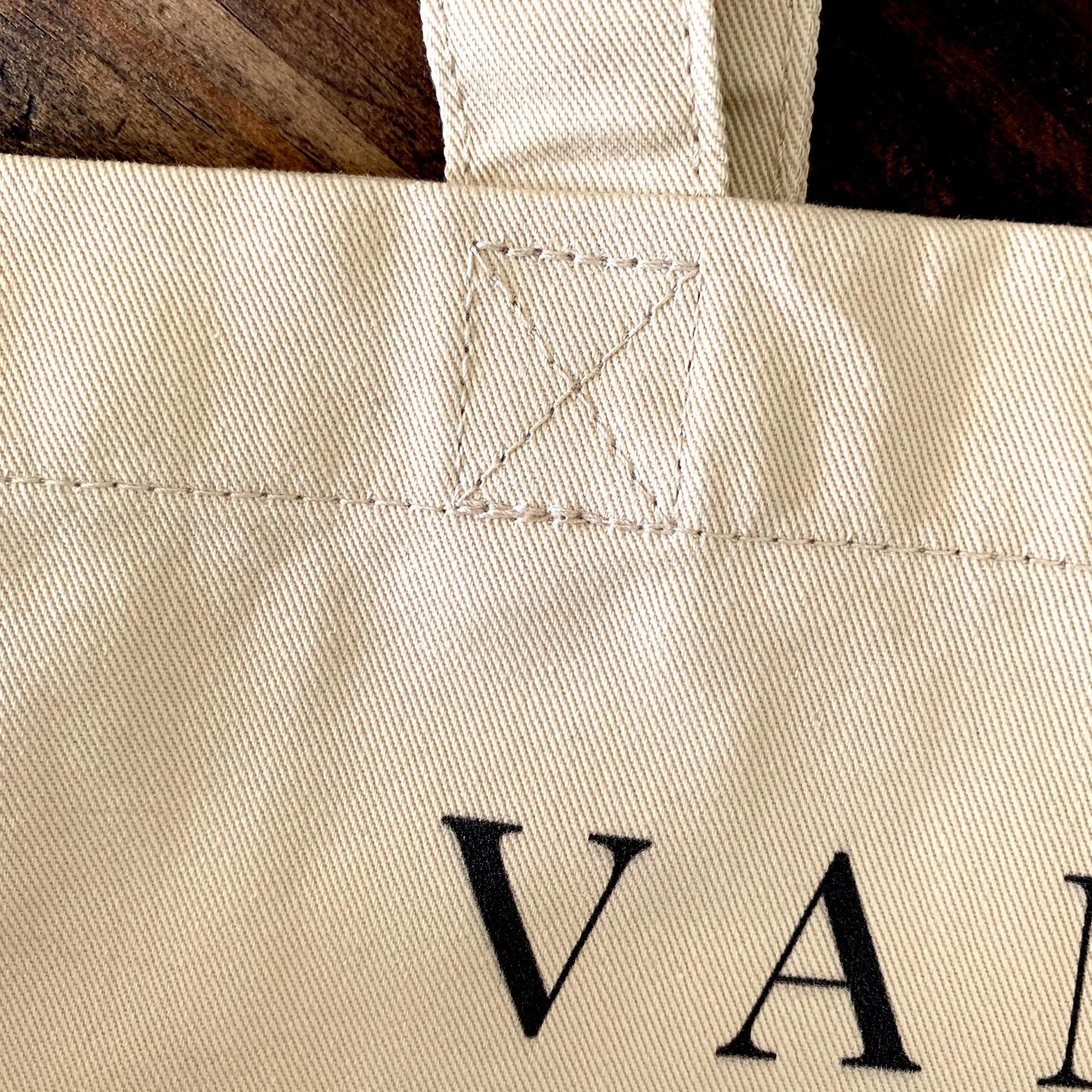 Vincent van Gogh Wheat Field With Cypresses print on an eco friendly market tote bag. Reinforced cross stitching on straps