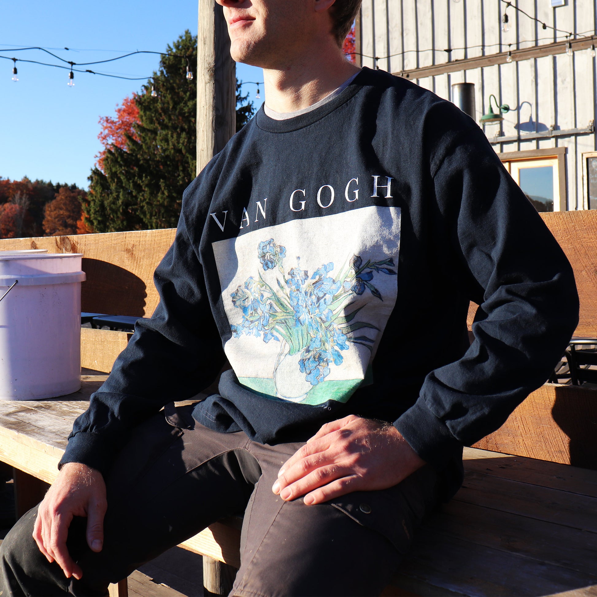 man wearing vincent van gogh long sleeve t shirt. whitney baldwin brand