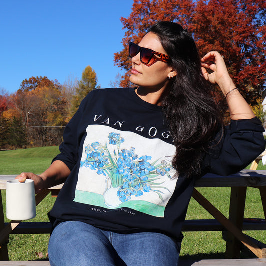 woman wearing whitney baldwin brand tshirt in the vincent van gogh irises print