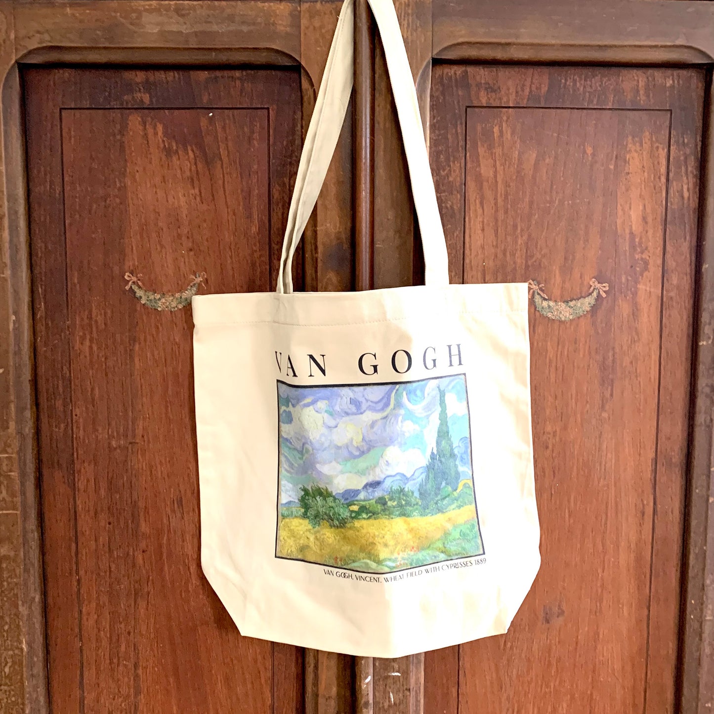 Vincent van Gogh Wheat Field With Cypresses print on an eco friendly market tote bag